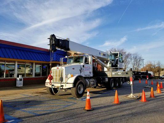 Setting up the crane for an HVAC lift at Burger King, Anderson, SC.