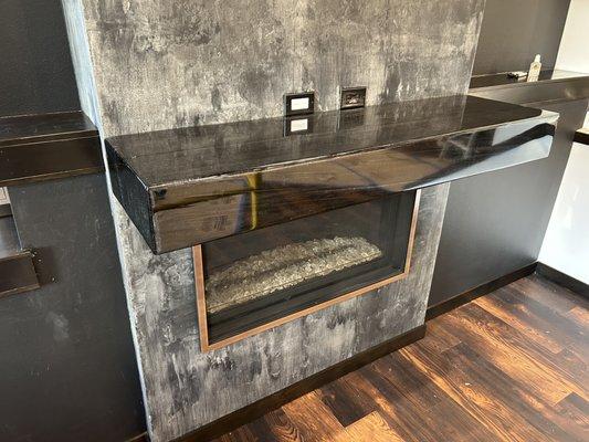 Faux distressed concrete Firplace with Charred-Fir Epoxy sealed Mantle