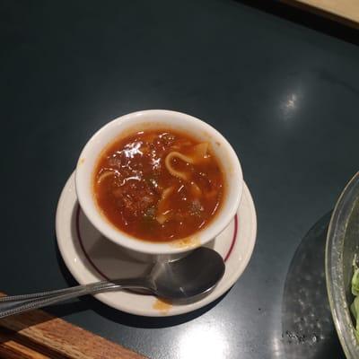 a cup of very salty veggie soup