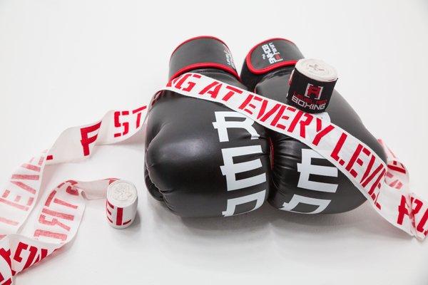 We've got you hooked up! We have gloves and wraps waiting for you at your free first class!