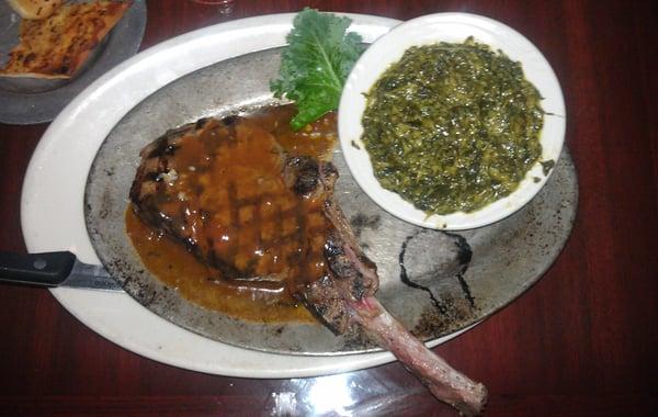 Special of the night demiglace bone in veal chop with spinach side