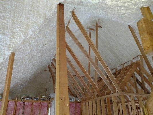 Open cell foam insulation in the roof deck of a new home.