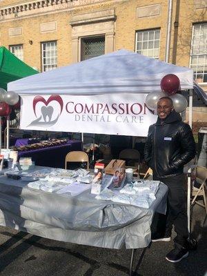 Dr Vertil at Compassion dental care's Booth For the Nyack Fair.