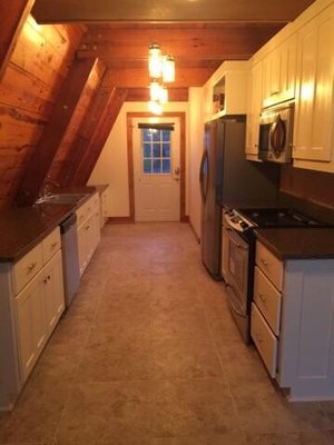 New cabinets, flooring, countertop and appliances