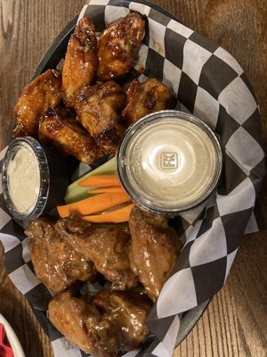 Wings with Thai peanut sauce and sweet chili sauce.