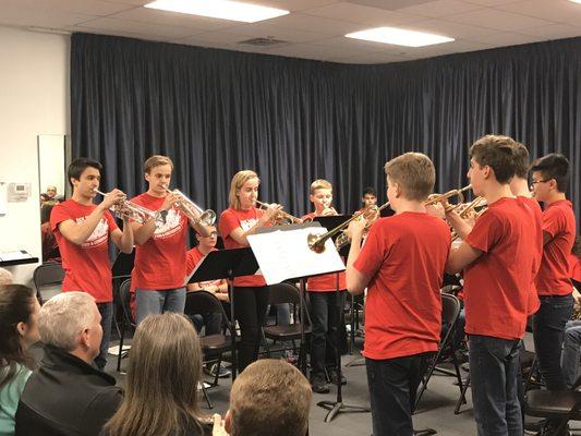 Students learning to play together in a small chamber ensemble without a conductor!