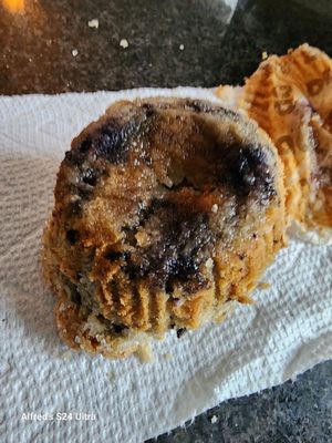 Wet and sticky bottom of muffin. Terrible quality.