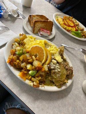 This is a Chile verde Chilaquiles with egg and home made potatoes.