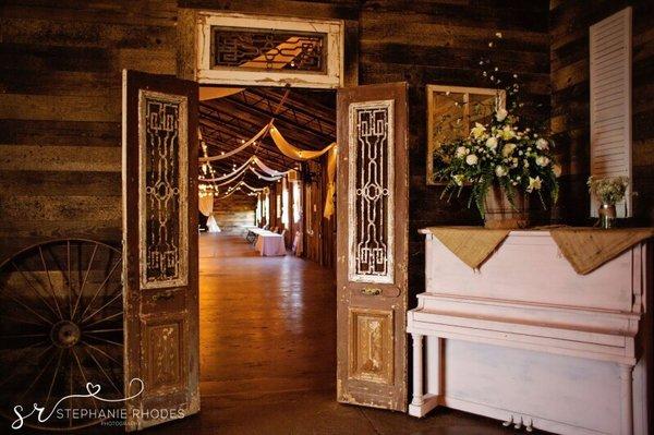 Entrance into the reception hall, this barn wedding venue is so gorgeous!!