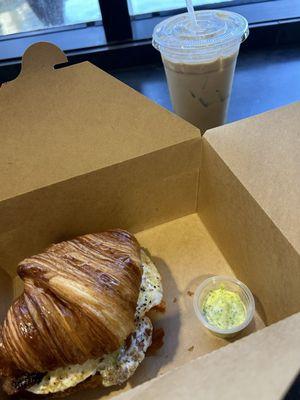 Fresh baked Breakfast croissant sandwich with the aioli of dreams