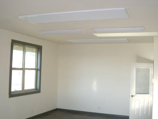 Easily installed on the ceiling, no noise or usable space taken up.  Controlled via a thermostat room by room.