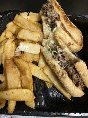 Steak and cheese with fries. after taking a bite to confirm what I was seeing