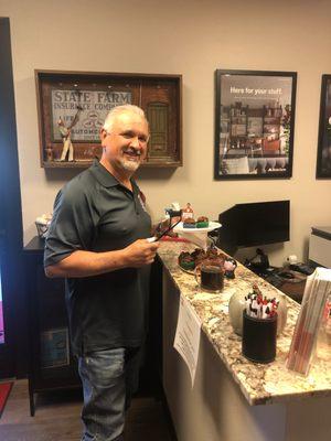 Best boss snacking on National Chocolate Cupcake day!