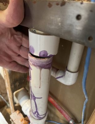 Vent pipe "glued" but not attached properly.