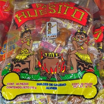 some interesting Mexican candy in the grocery section...peach flavored bone shaped suckers covered in chile