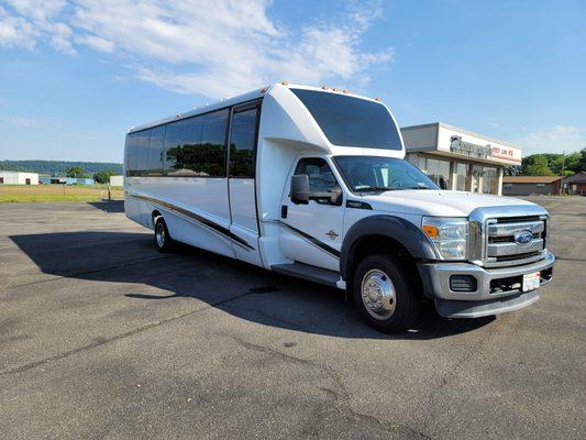 Newly upgraded 27 passenger Shuttle bus