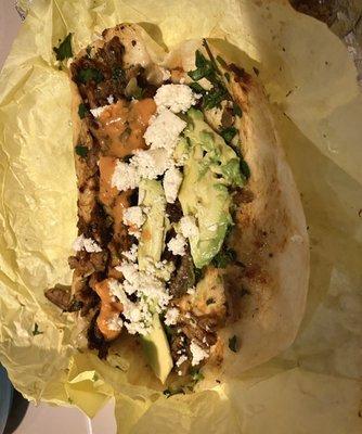 I added some avocado, fresh cheese, and their chipotle garlic sauce to the tacos Árabes. Mmm...flavor!