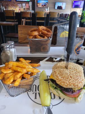 Awesome cheese burger, fries and onion rings. Everything so good