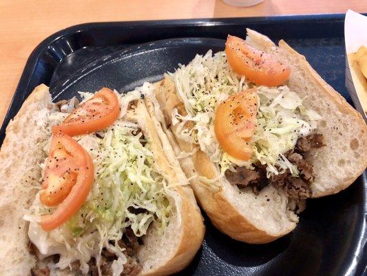 Cheese Steak - Served with lettuce, tomatoes, mayo, onions, and Italian dressing.