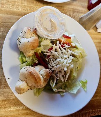 Fresh garden salad with garlic knots