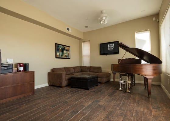 An homage to the Downtown Phoenix Arts District and to our Founder's love of music, our firm has a 1920's grand piano in the lobby.