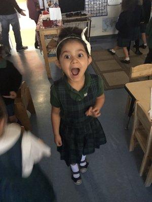 Chloe in her school uniform in class!