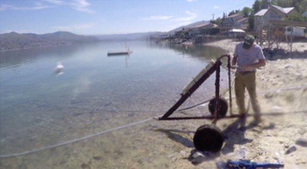 Working on a submersible water pump on Lake Chelan.