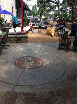 Circular space in front of fireplace with 5 wooden rockers for lounging. Pups & kids welcome!