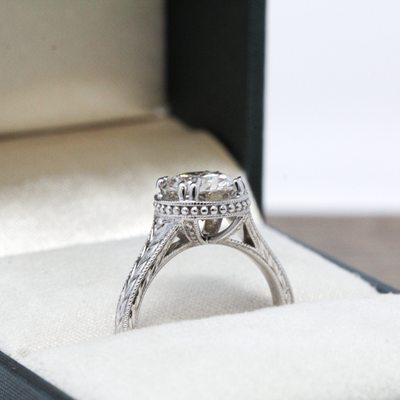 Custom vintage inspired solitaire engagement ring.