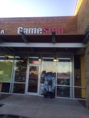 Front of the store, located in between Lovely Nails and Palm Beach Tan