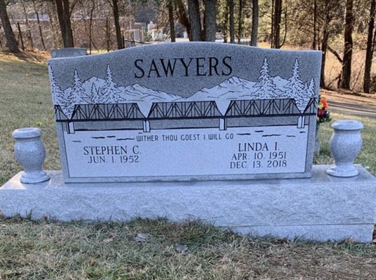 A companion memorial (Double) with custom design. Shown with addition base (Plug) for hillside slopes. Georgia Grey Granite.