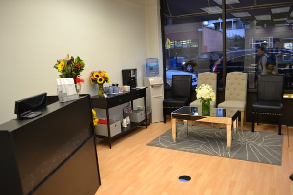 Cozy reception seating area, with refreshments and treats.