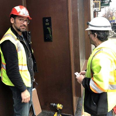 Our lead engineer coordinating the installation of a NoHo condo's intercom system.