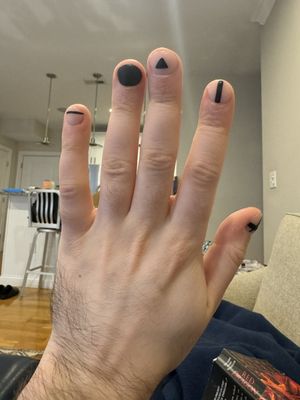 Minimalist nude and black matte manicure by Marie from Park and Polish in Newton (left hand)