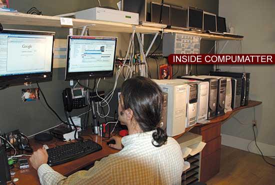 Owner / Technician Jay Lepore working on multiple computers simultaneously