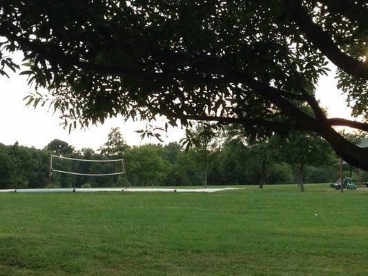 Pic of the sand volleyball court from the view of the trail