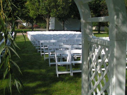 White Wood Folding Chairs and Plymouth Archway