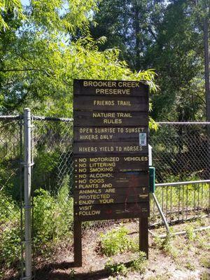 Trail entrance sign at the end of Lora Lane