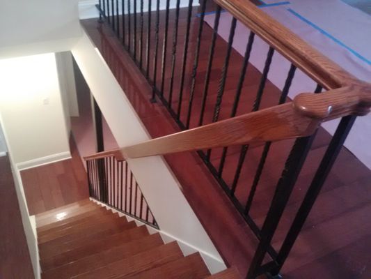 We stained and applied polyurethane on new steps and banister