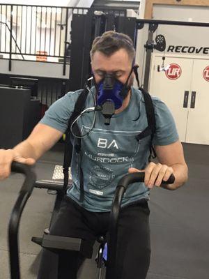 Coach Darren on a fan bike V02 sub-max assessment at Urijah Faber's Ultimate Fitness on Folsom Blvd in Sacramento, CA.