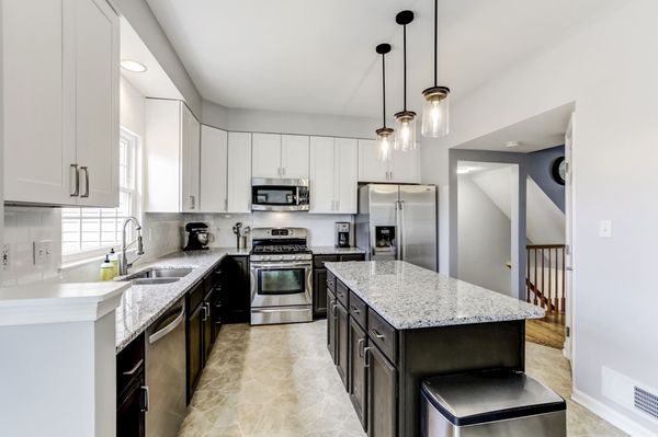 Albert and his team installed the top white cabinets, white subway tile, sink, faucet and granite.  Job well done.