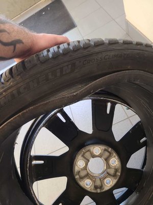 Slash in tire fixed by Costco tire (with a replacement covered under road hazard warranty).