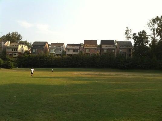 The field behind the main playground. Great for soccer, football, Frisbee, and merriment!  Not shown in pic are 2 bleacher sets.