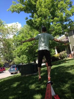 Jessie playing on his slack line. A great way to improve coordination and balance!