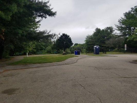 Ball field, benches, a picnic table and a short hiking trail off parking area