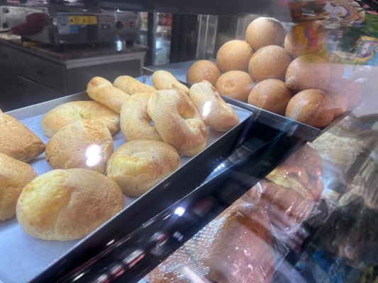 Cheese bread in different shaped and sizes.