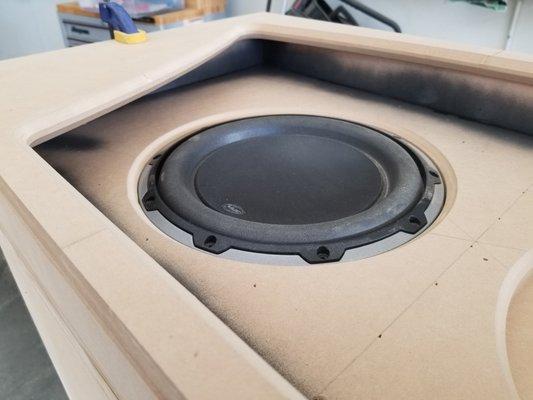 Custom box for two JL audio subs playing off the old Red eye boxes.