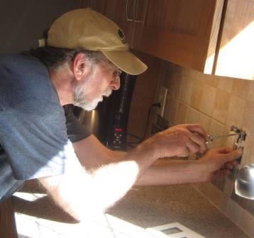 Reliable Bob puts a finishing touch on a new kitchen & major addition in Westford, MA.