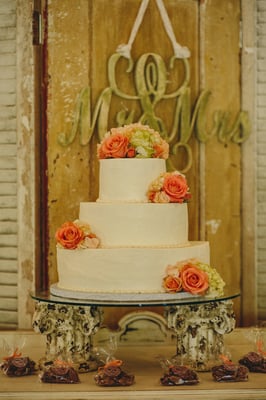 My wedding cake from Cakes by Kathy. Kathy placed the flowers, from Flowers Flowers Inc. Photo by Mercedes Morgan.