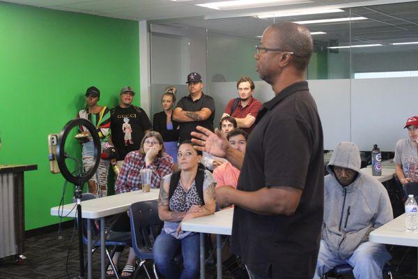 Eager Minds: Media Students Absorb Instructor's Wisdom.